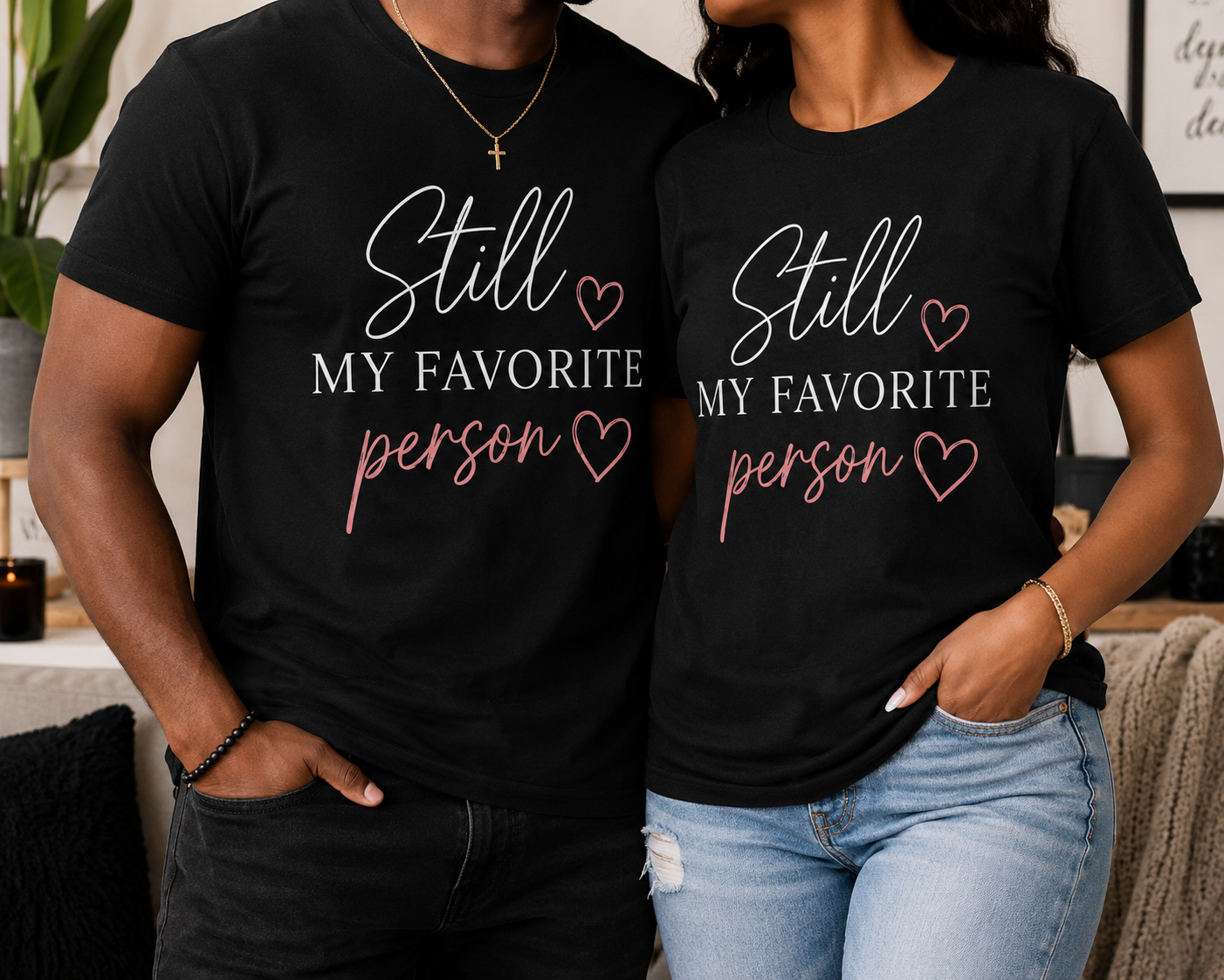 Couple wearing Still My Favorite Person unisex black T-shirts with natural straight hems