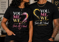 Couple wearing You Me We coordinated unisex black T-shirts with natural straight hems